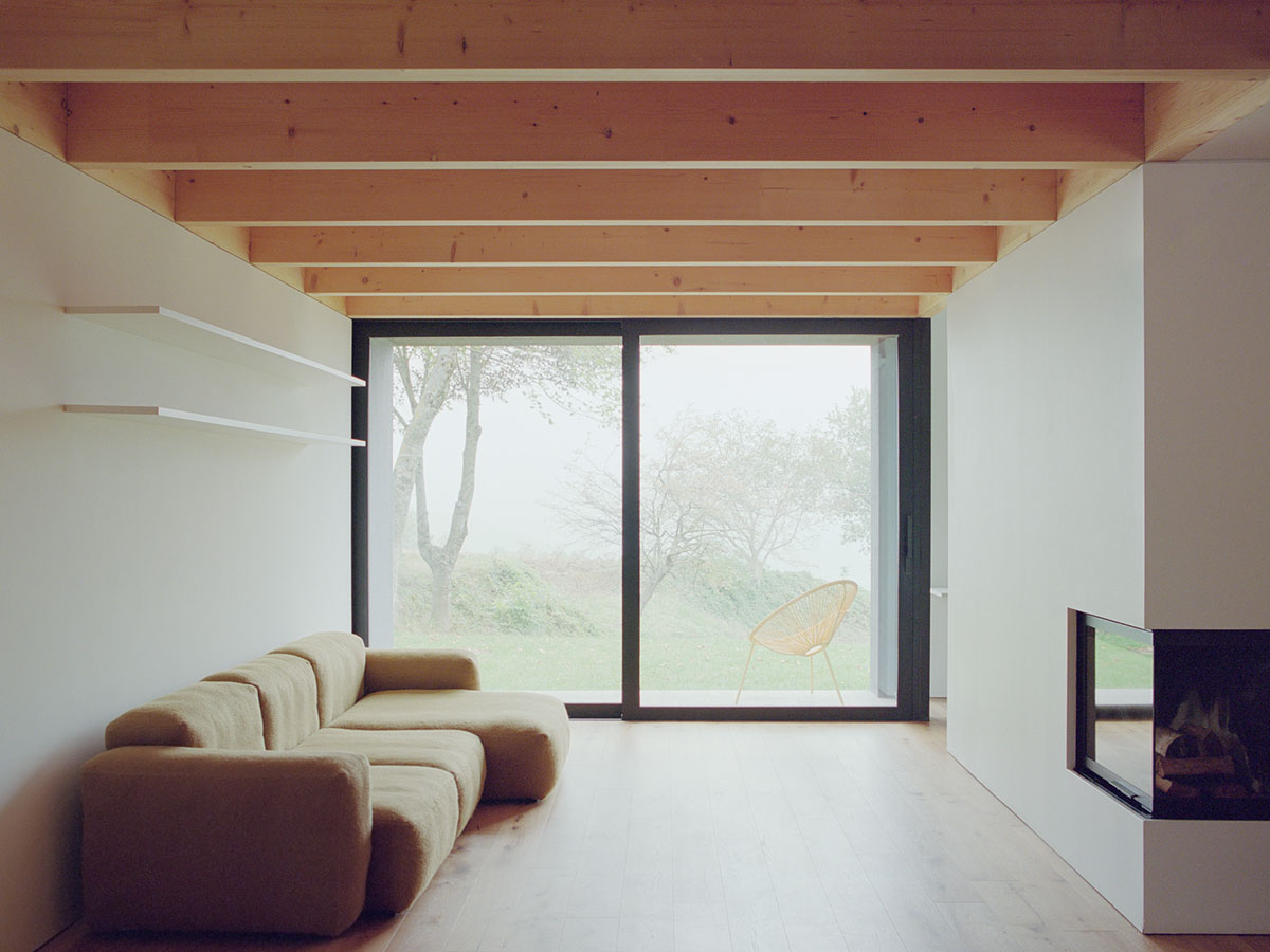 LADO architetti transforms 1970s house into a clean, monochromatic volume in Italy