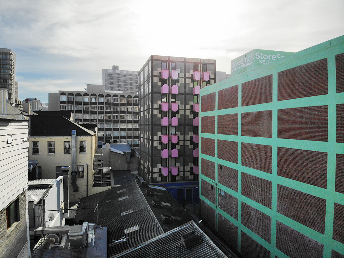 Two Five Five Architects adds protruding bright pink marshmallow balconies to apartment in Cape Town