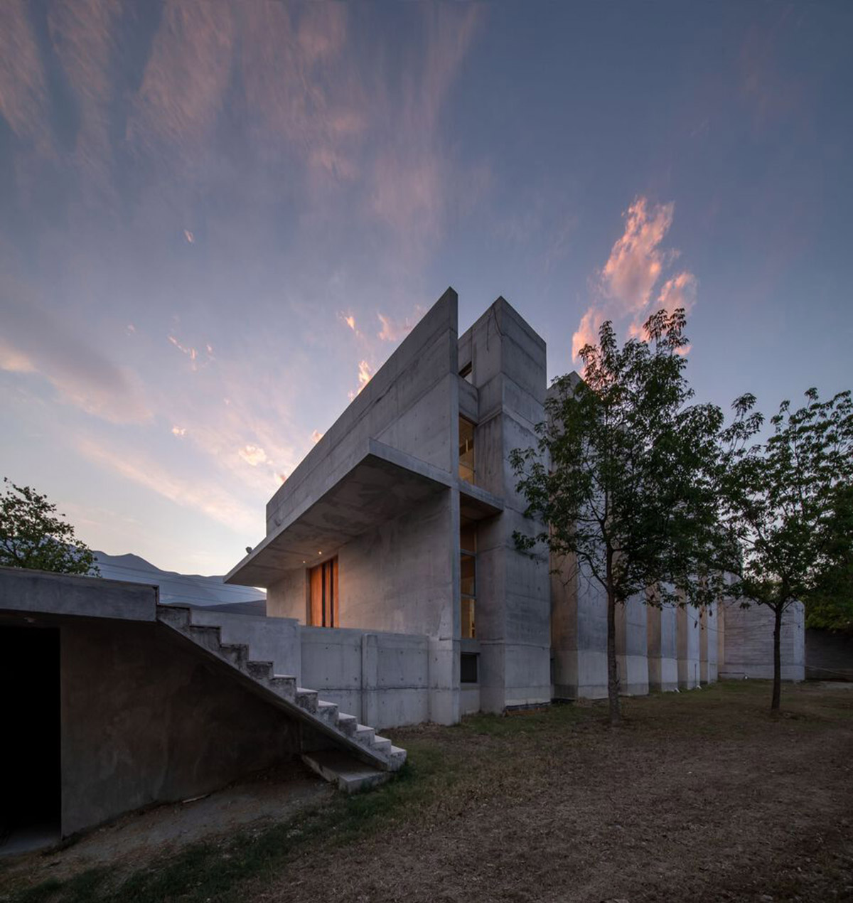 Sliced concrete walls create rhythm and allow abundant natural light for chapel in Monterrey