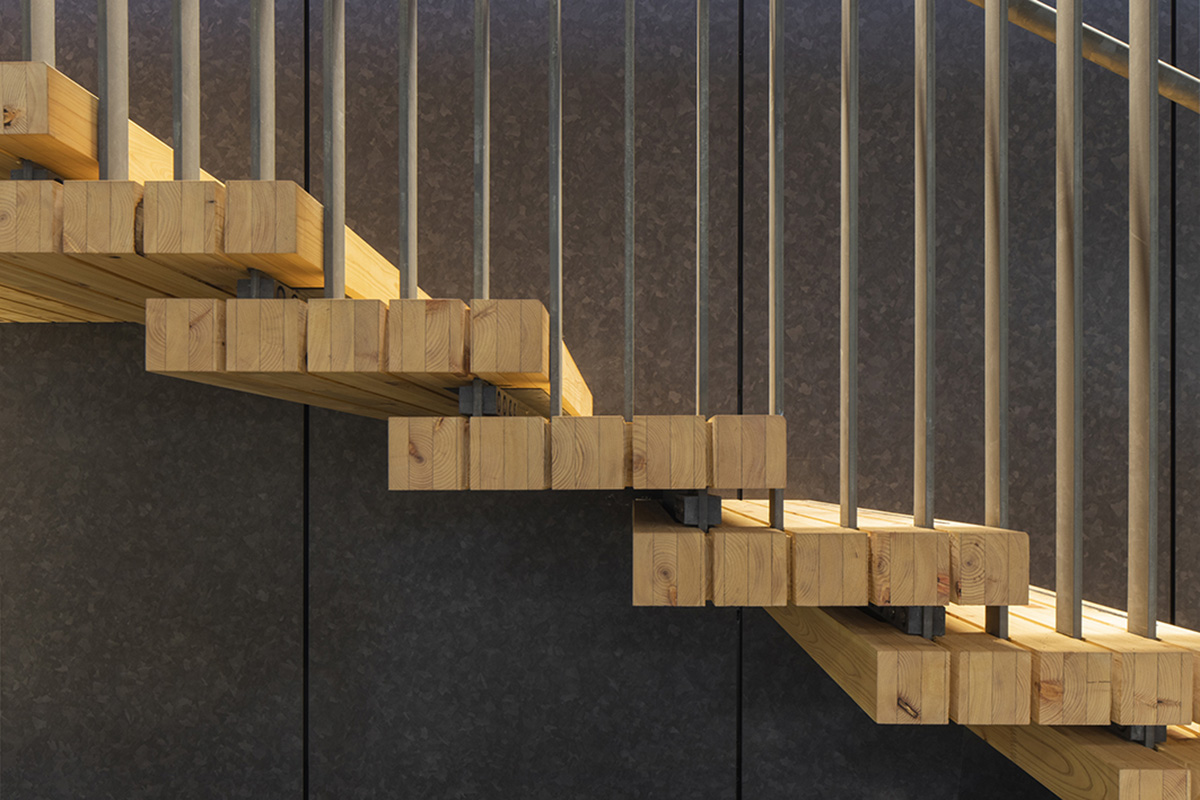 Nikken Sekkei and Shimizu Corporation-designed gymnastics centre features a floating wooden vessel