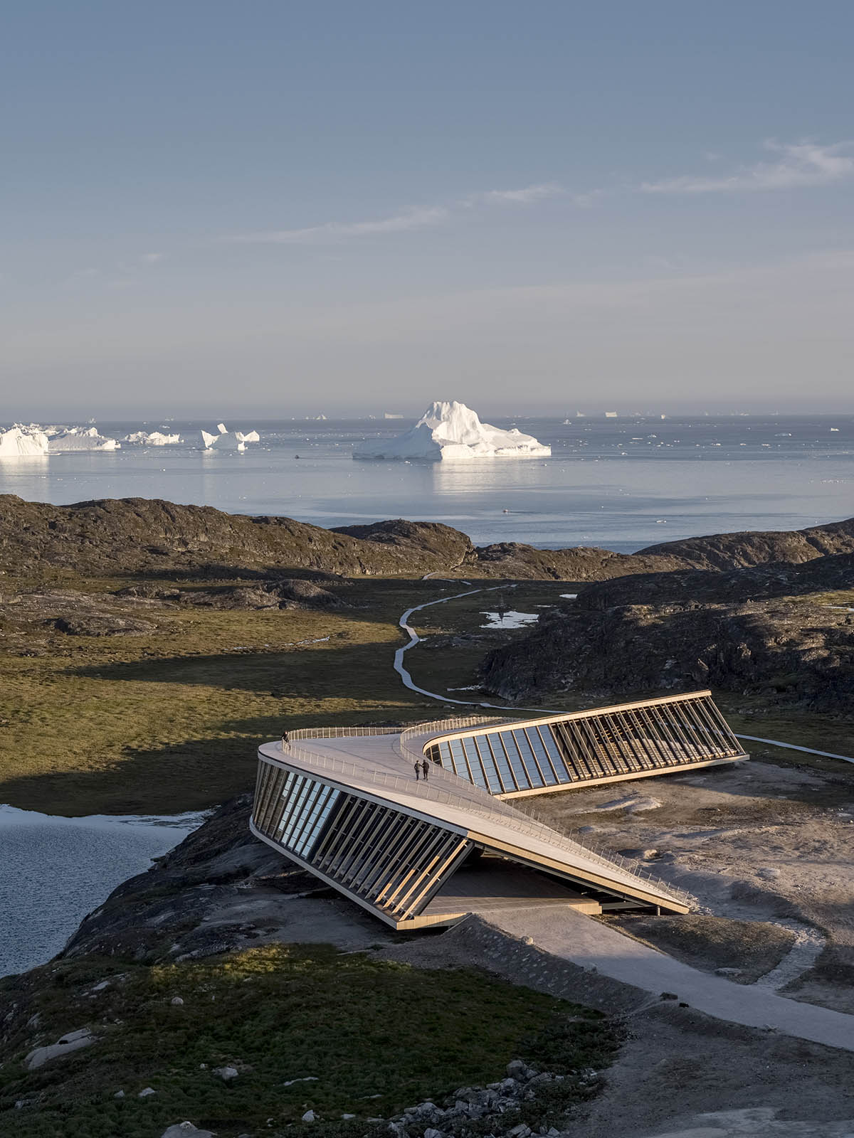 Dorte Mandrup completes curved Icefiord Centre in the UNESCO-protected area of Greenland