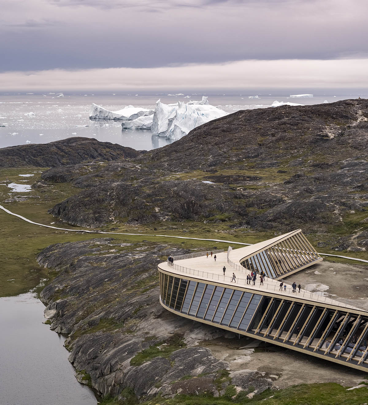 Dorte Mandrup completes curved Icefiord Centre in the UNESCO-protected area of Greenland