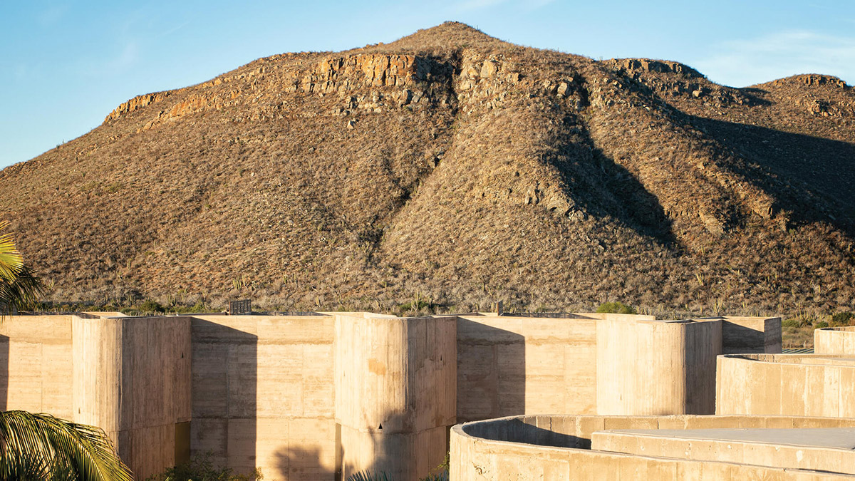 Resort mimics natural motion of desert with punctuated beige-coloured concrete volumes in Mexico 
