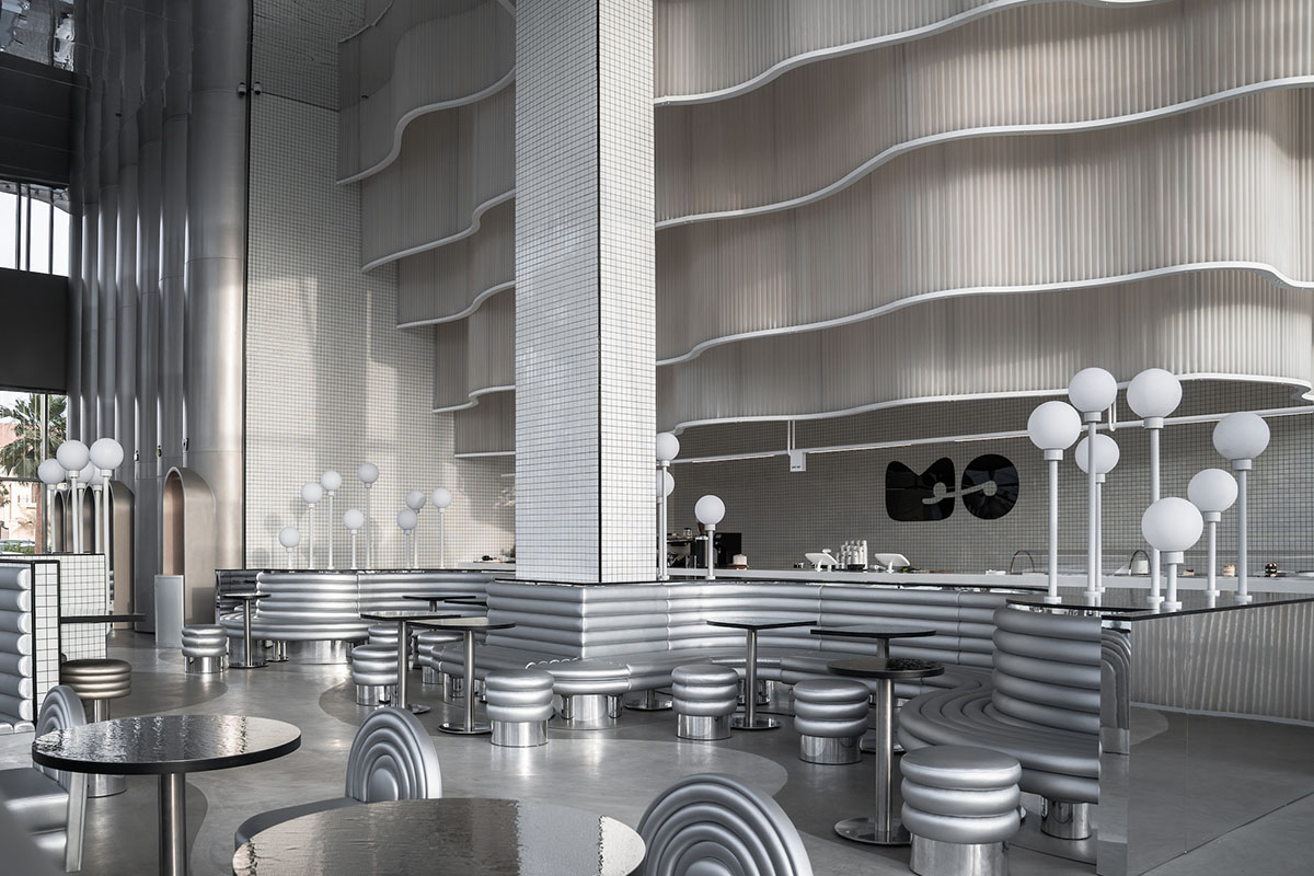 Masquespacio creates metallic interiors and water-inspired spaces for bakery in Saudi Arabia 