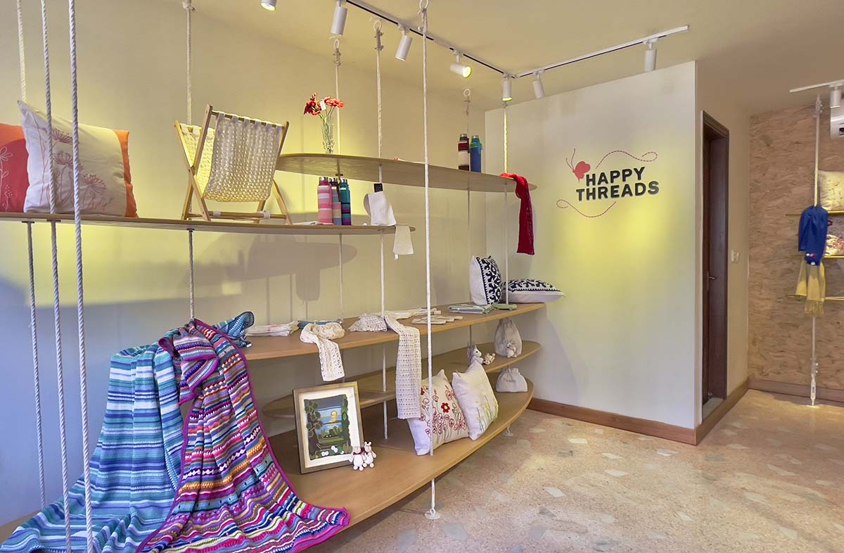 Happy Threads: Minimal yet Upbeat Display Room by Open Door Design Studio