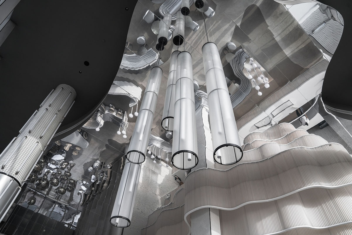 Masquespacio creates metallic interiors and water-inspired spaces for bakery in Saudi Arabia 