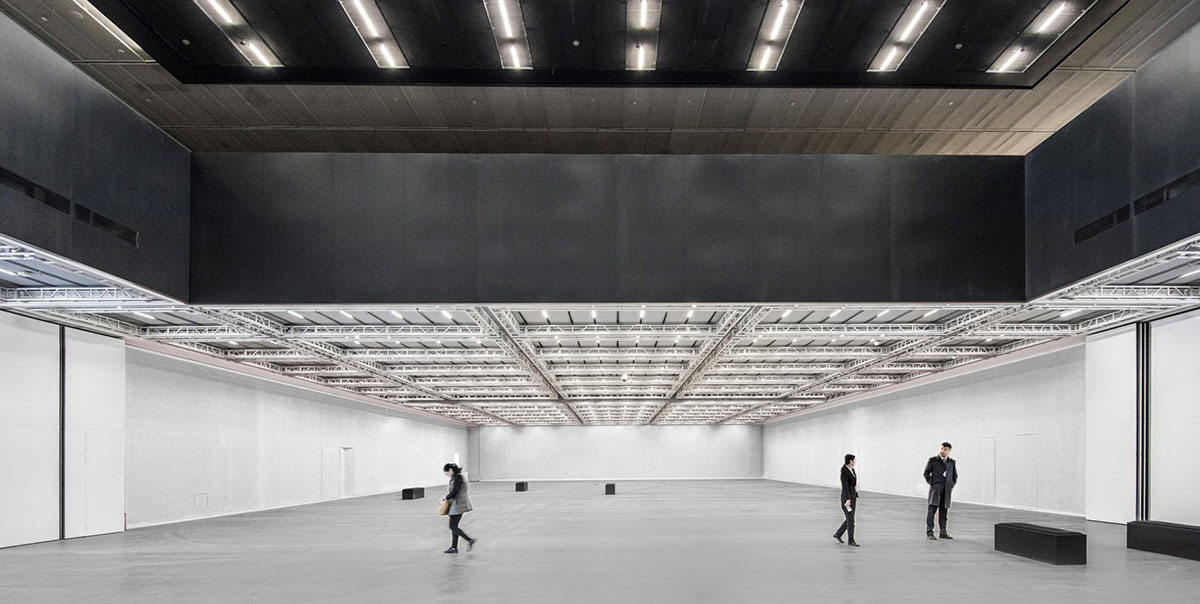 Büro Ole Scheeren completes Guardian Art Center featuring pixelated volumes and floating box