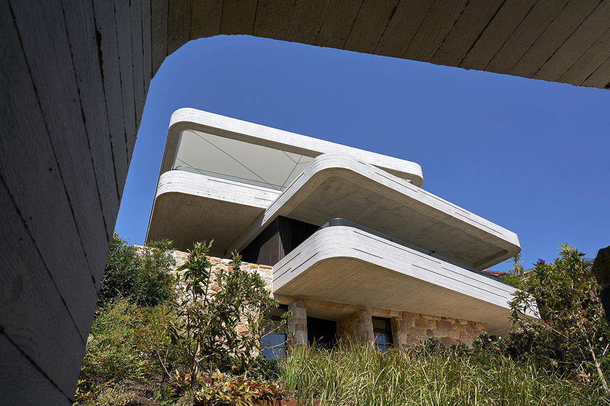 Luigi Rosselli Architects' Book House features shifted concrete slabs overlooking Sydney harbour