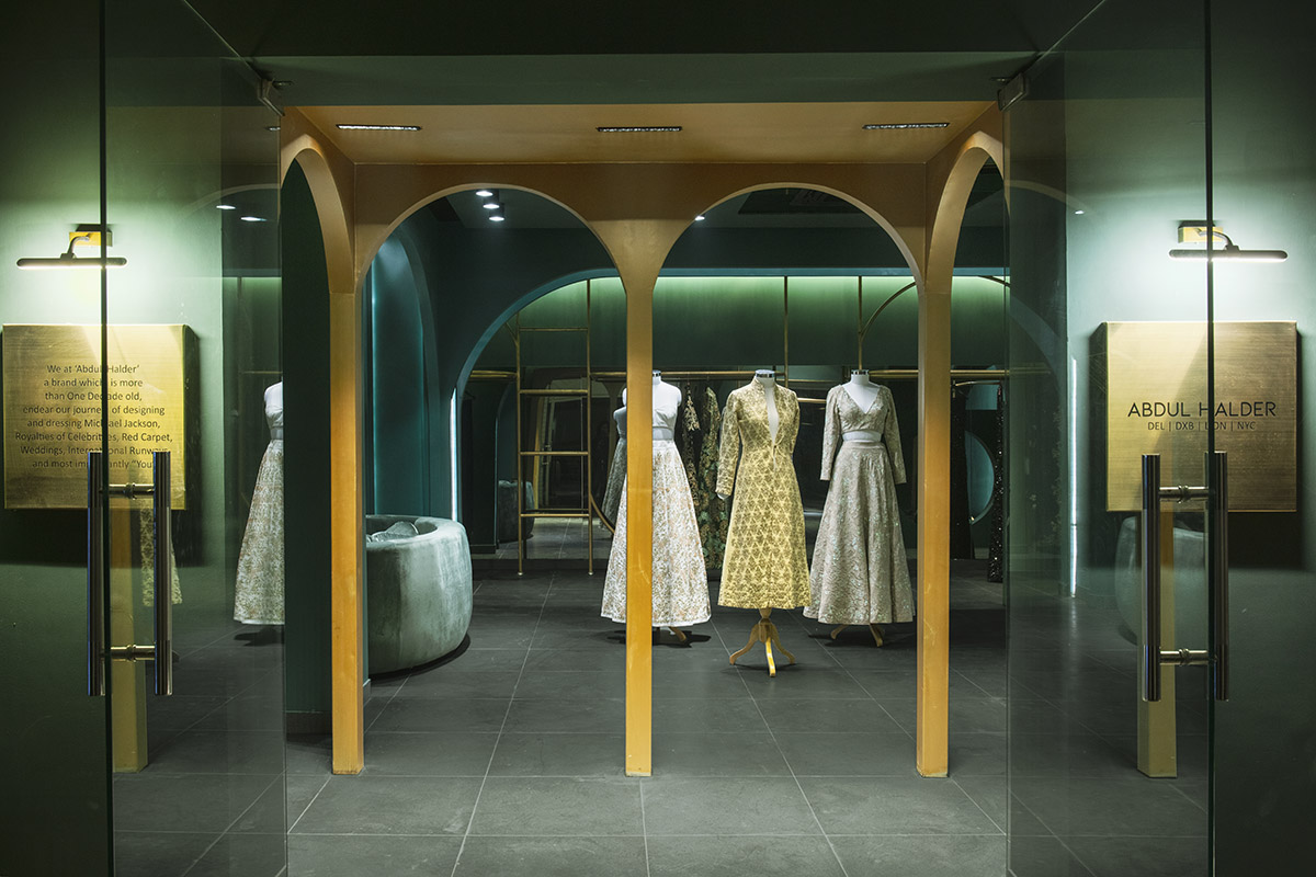 Pantone Collective Design Studio used dark colors of green in this flagship store in New Delhi