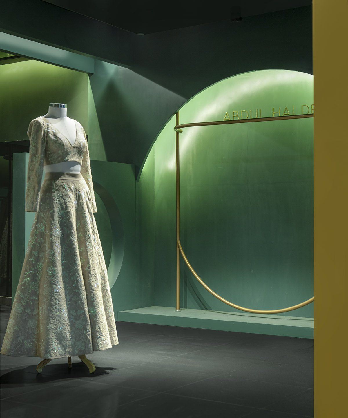 Pantone Collective Design Studio used dark colors of green in this flagship store in New Delhi