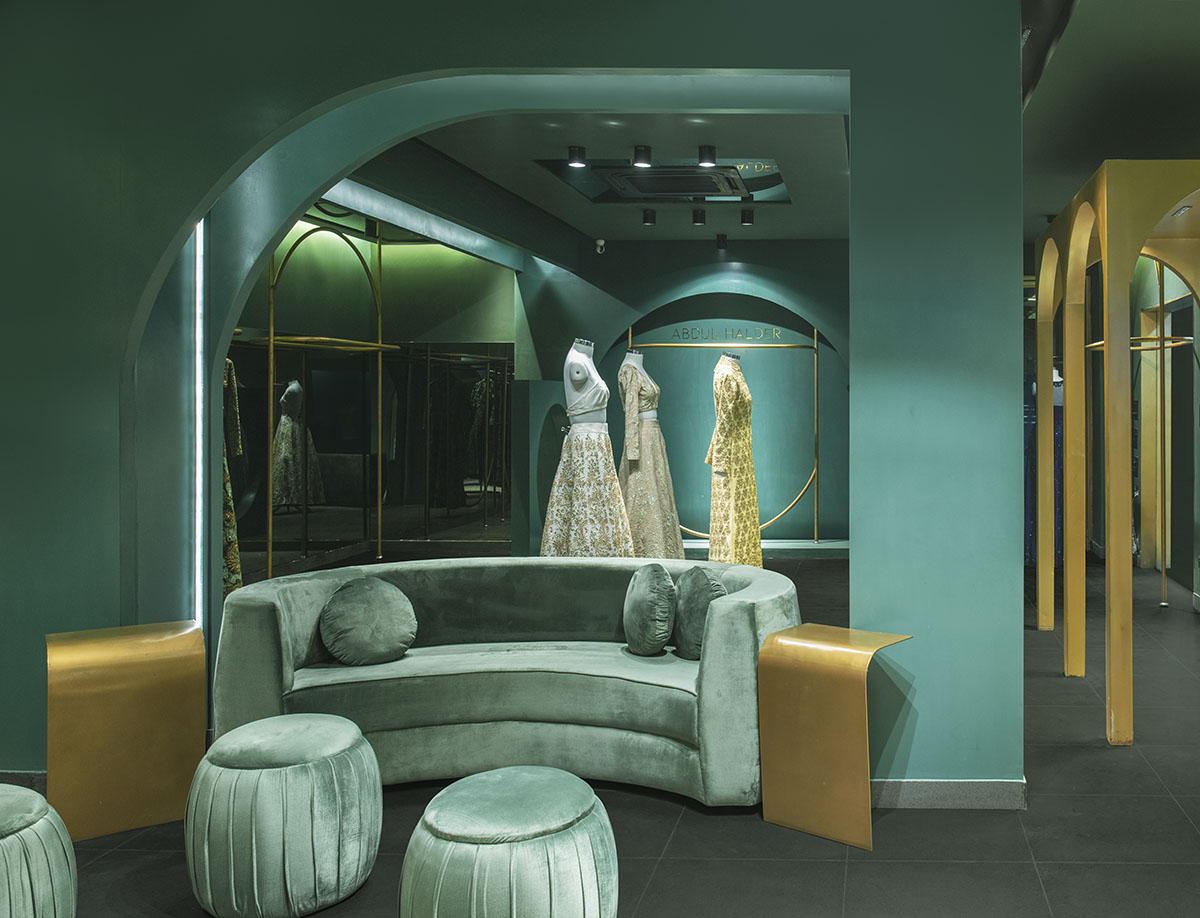 Pantone Collective Design Studio used dark colors of green in this flagship store in New Delhi