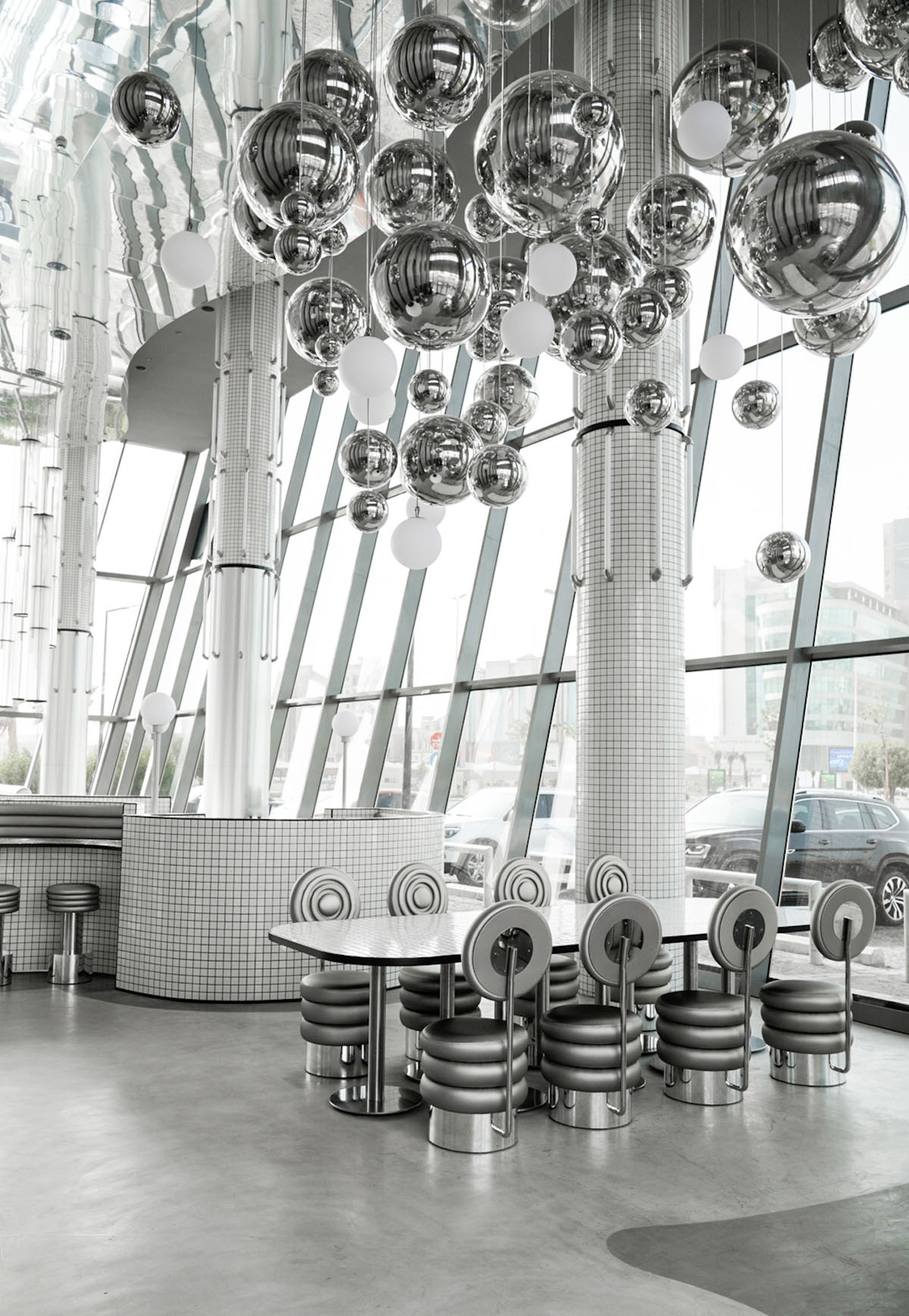 Masquespacio creates metallic interiors and water-inspired spaces for bakery in Saudi Arabia 