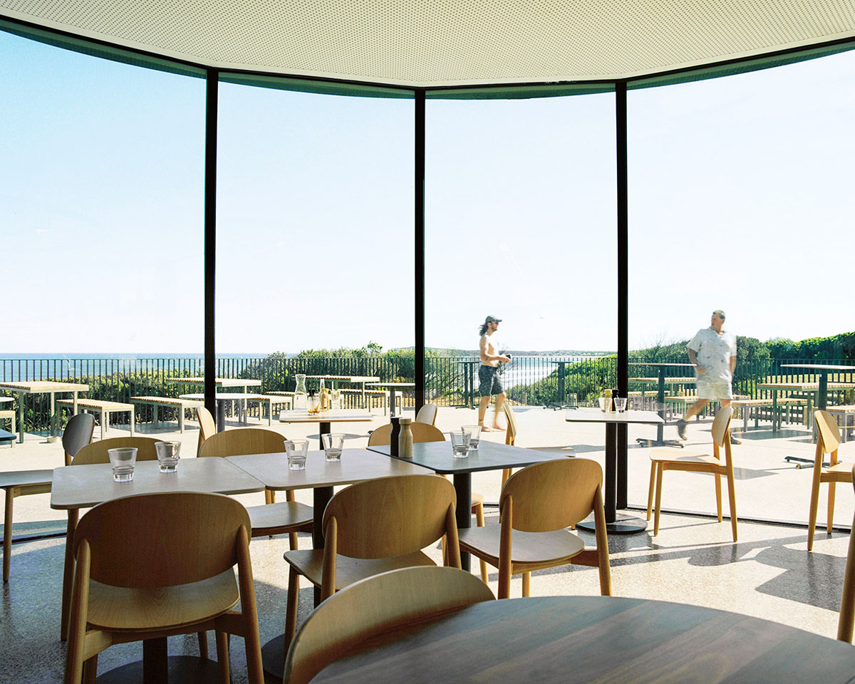 Wood Marsh completes surf club with timber rounded corners echoing ocean and eroded dunes