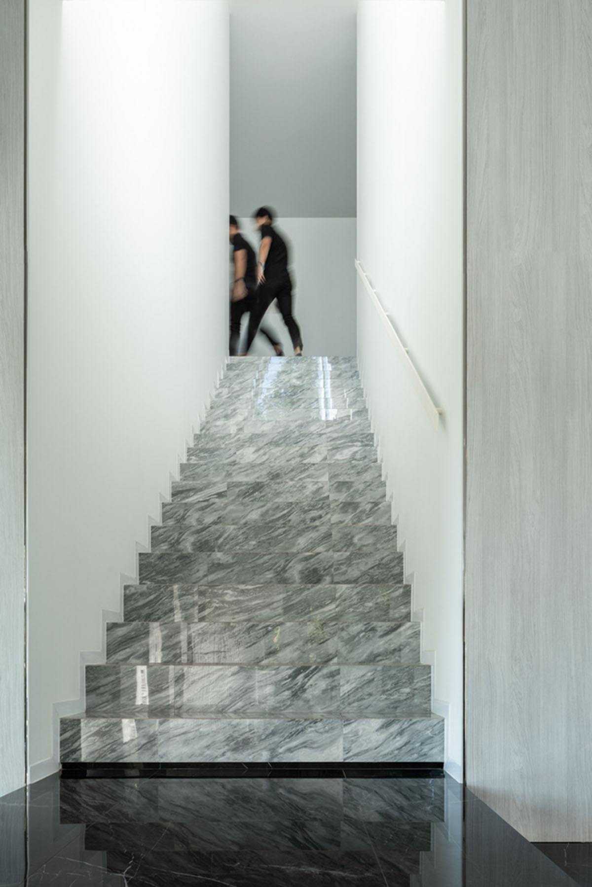 AAd built self-sustainable residence with perforated facade and steel rods in Thailand