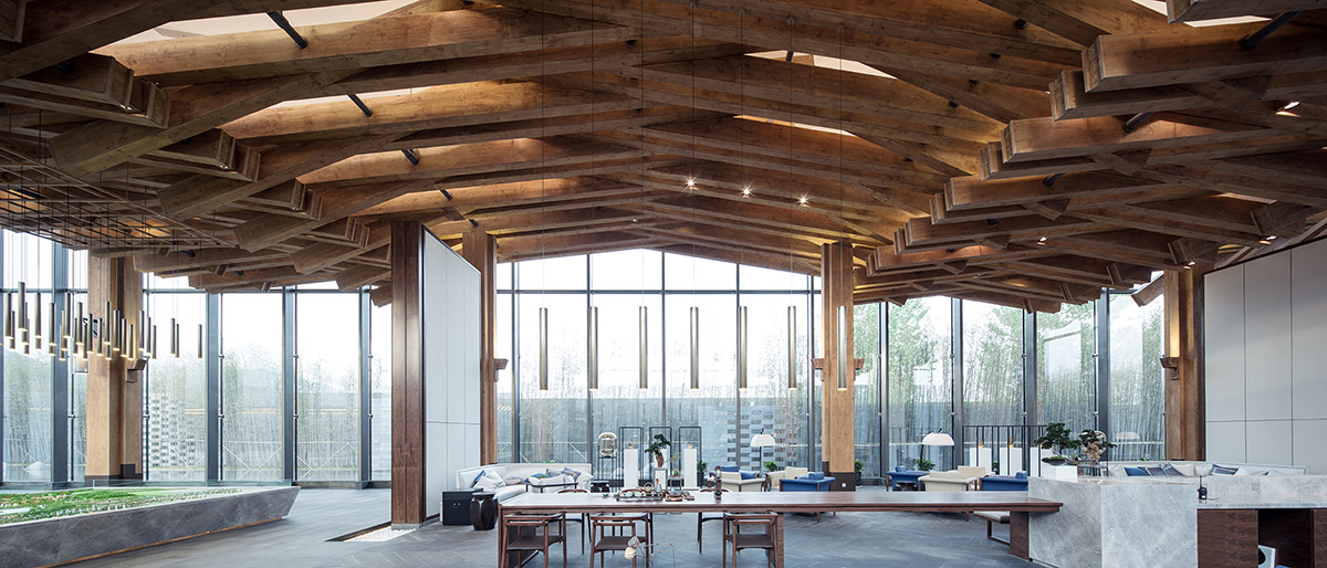 Continuation Studio overlaps short timbers to create long-span for community centre in China