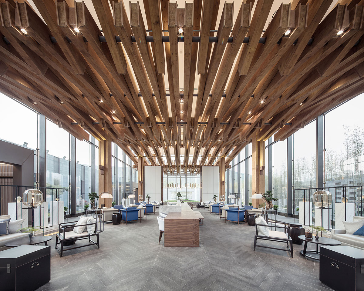 Continuation Studio overlaps short timbers to create long-span for community centre in China