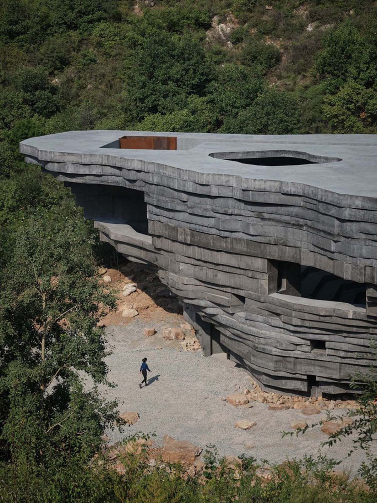 OPEN Architecture designs monolithic rock-like open-air concert hall in the north of Beijing