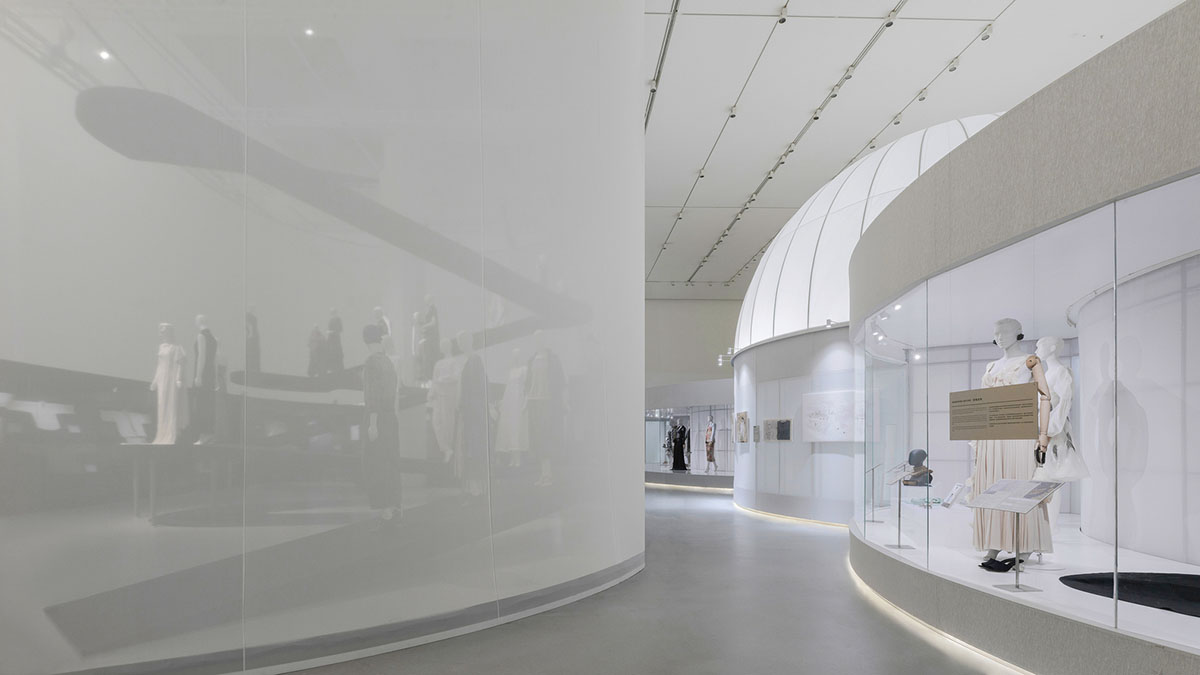 Studio 10 designs exhibition space with white tubular structures and black translucent ramps in China