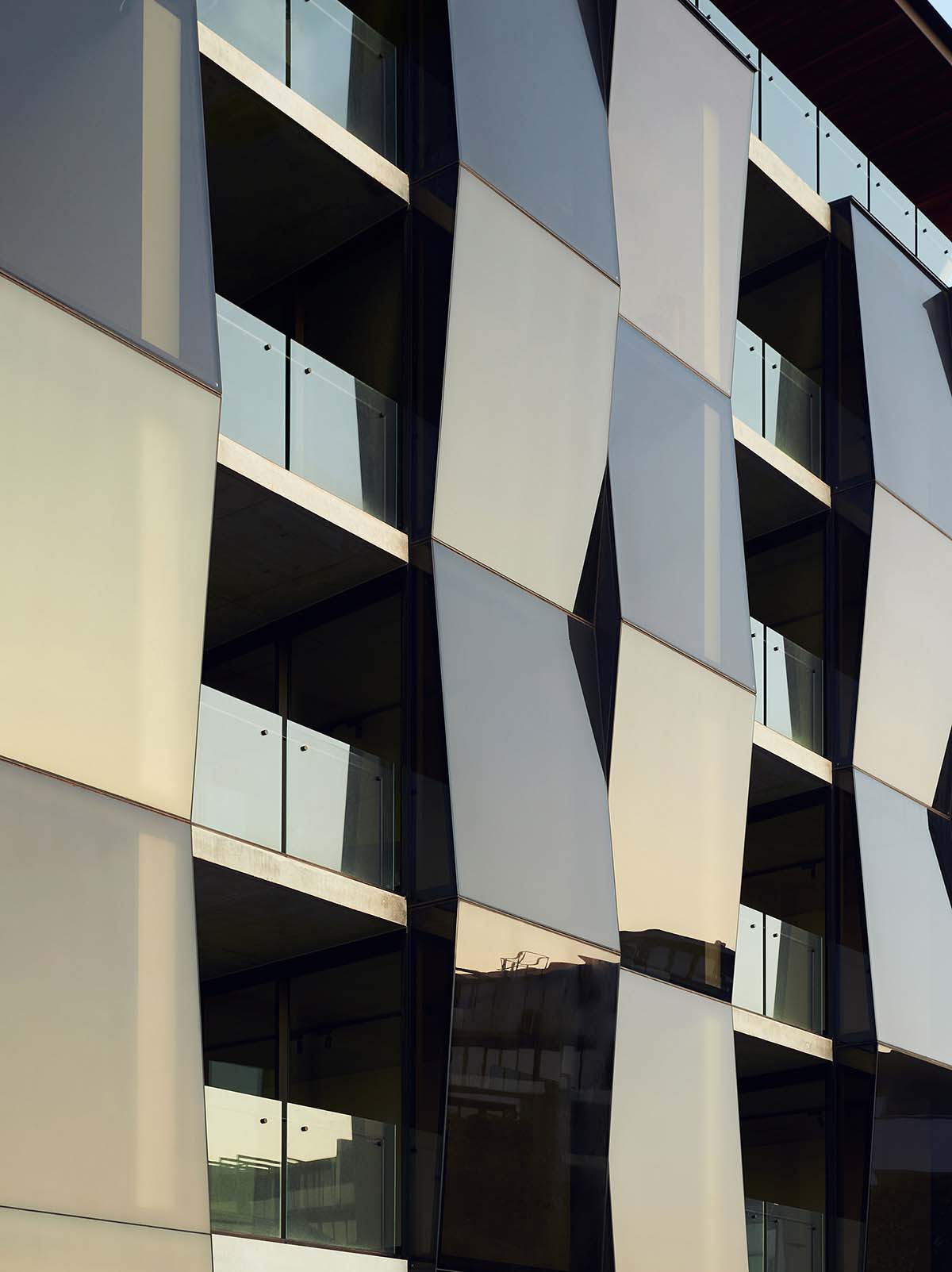 Wood Marsh's Alumuna Residences feature bronze folded mirrored glass in Australia
