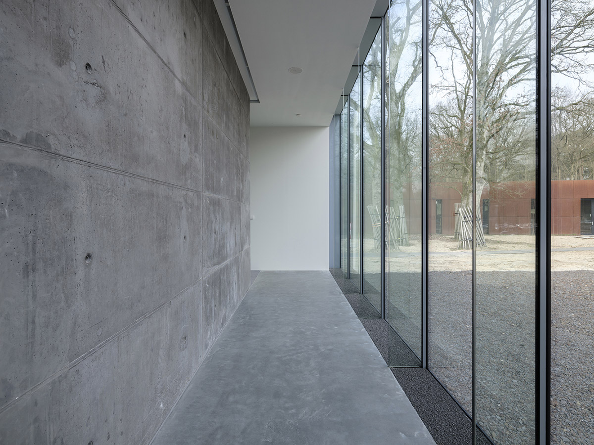 Inbo BV redesigns historic prisoner camp site with reflective pavilion and underground museum