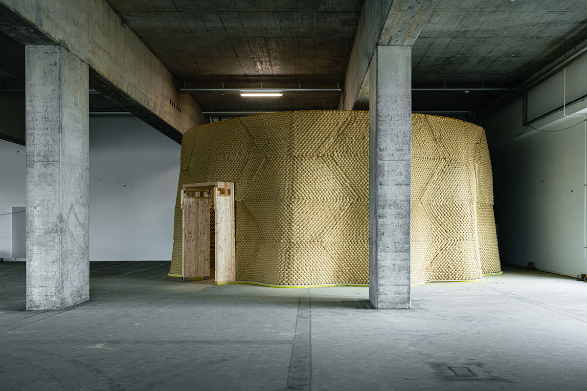 Gramazio Kohler Research used 30,000 soft clay bricks to install undulating clay rotunda in Bern