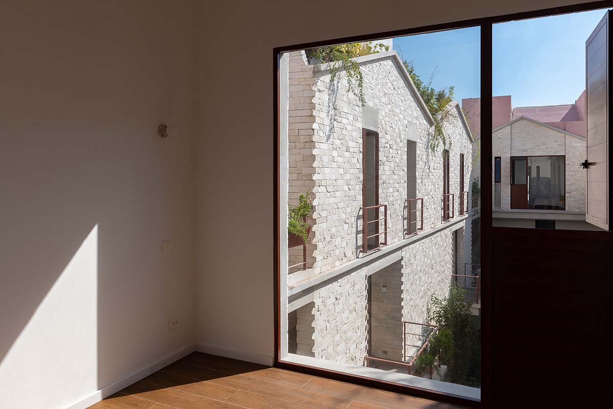 CPDA Arquitectos completes housing with dusty pink residential volumes in Mexico city