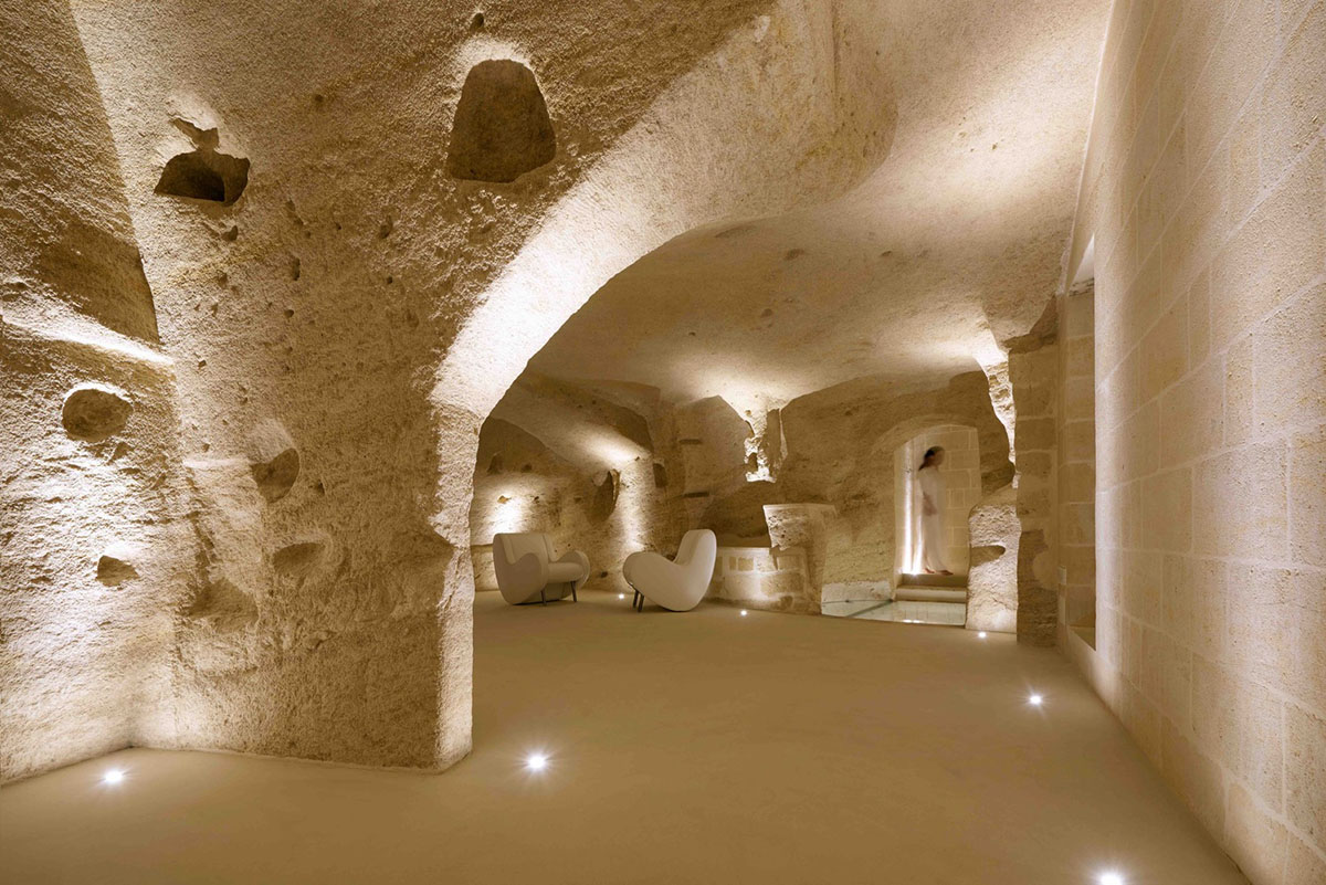 Interiors of this cave hotel and spa by Simone Micheli act like work of art with excavated surfaces