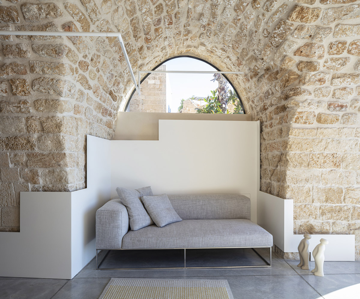 Pitsou Kedem Architects creates interior with arched doorways in a historic apartment in Israel