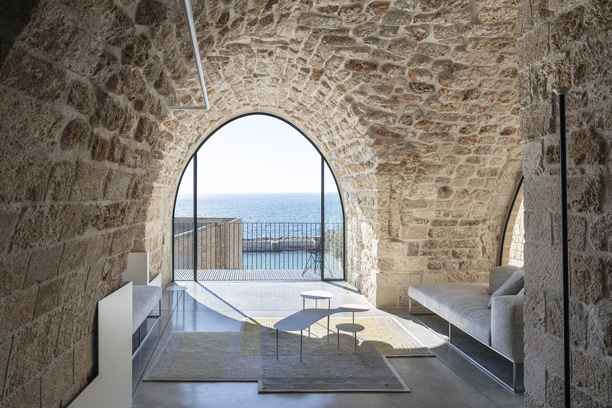 Pitsou Kedem Architects creates interior with arched doorways in a historic apartment in Israel