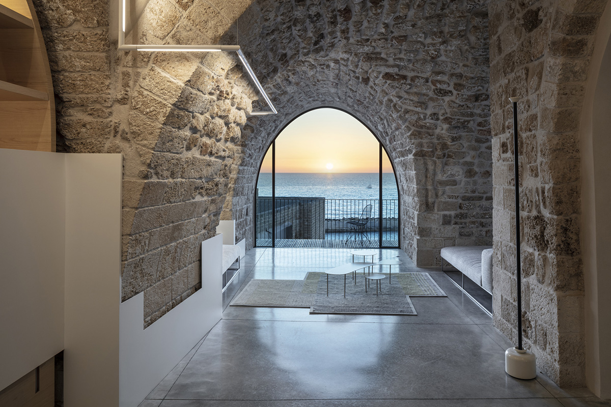 Pitsou Kedem Architects creates interior with arched doorways in a historic apartment in Israel