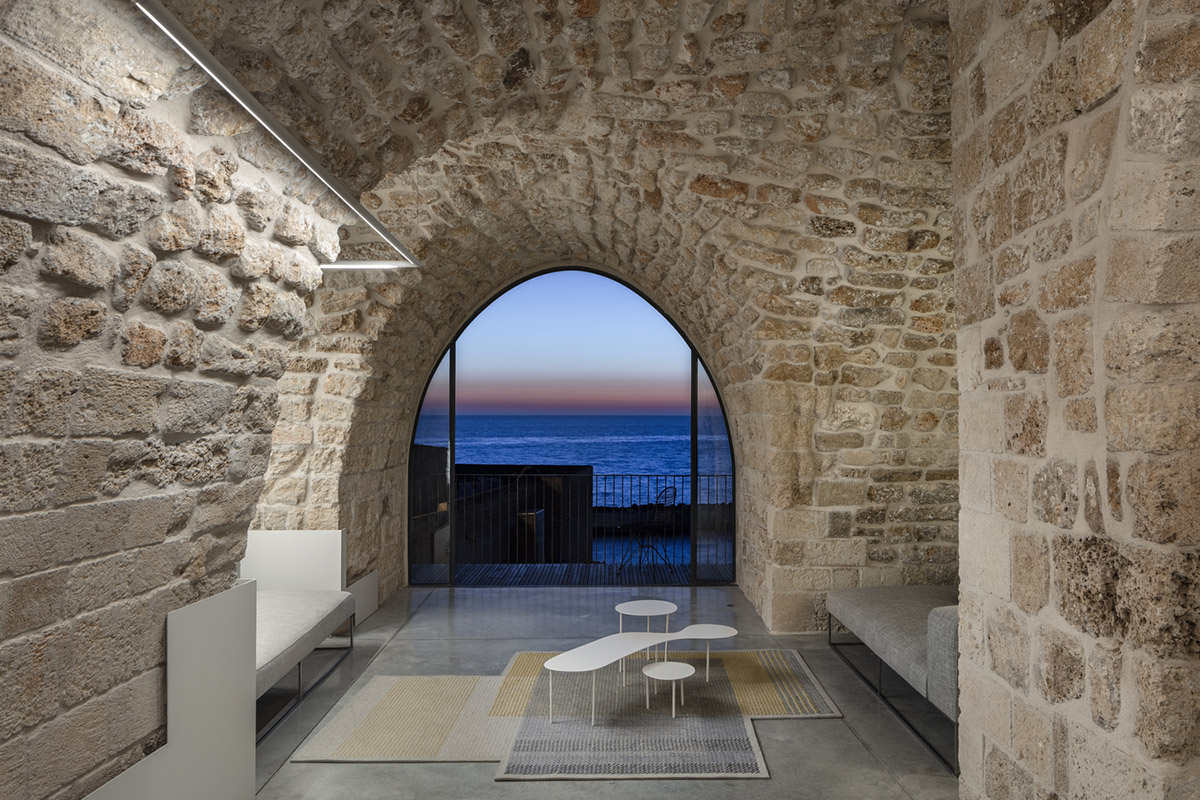 Pitsou Kedem Architects creates interior with arched doorways in a historic apartment in Israel