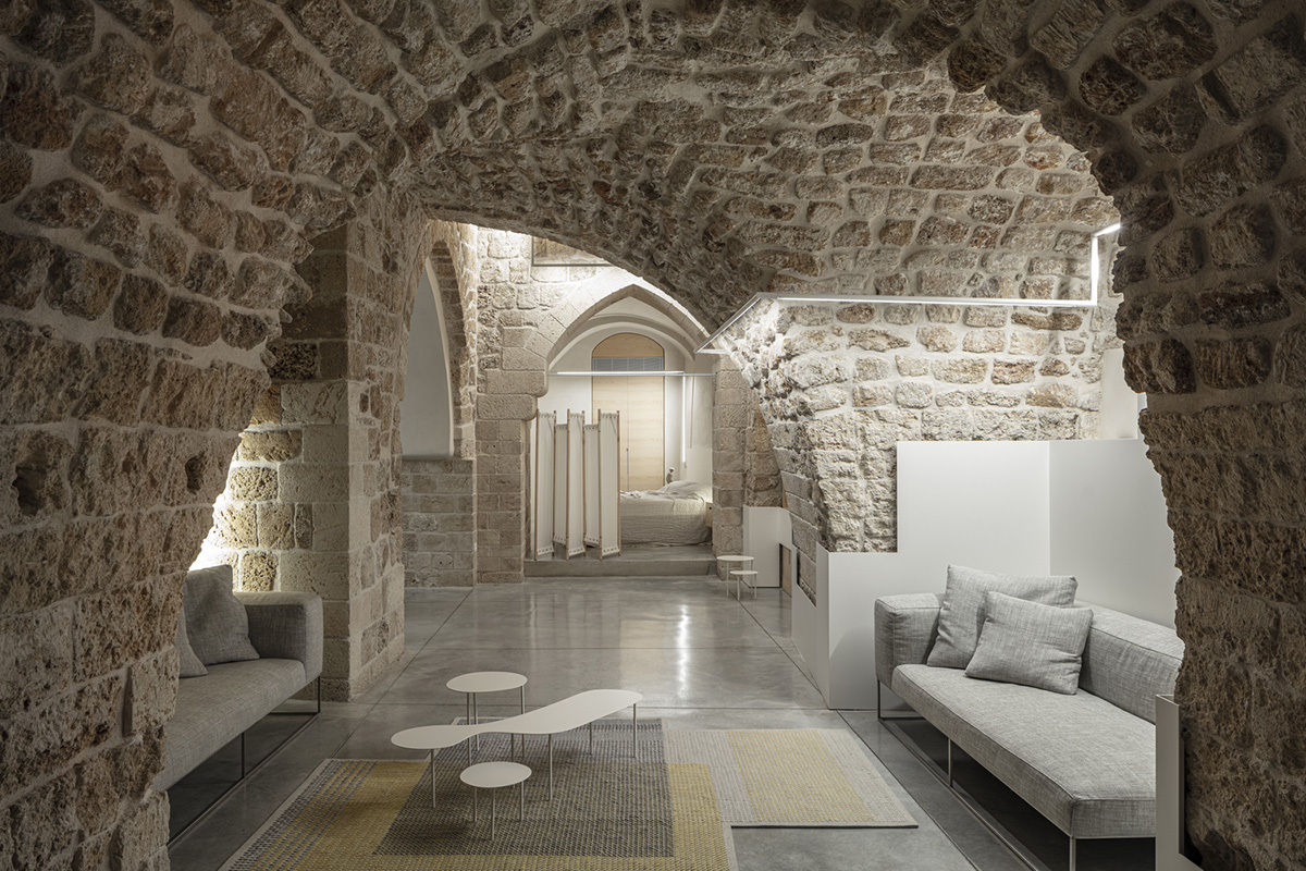 Pitsou Kedem Architects creates interior with arched doorways in a historic apartment in Israel