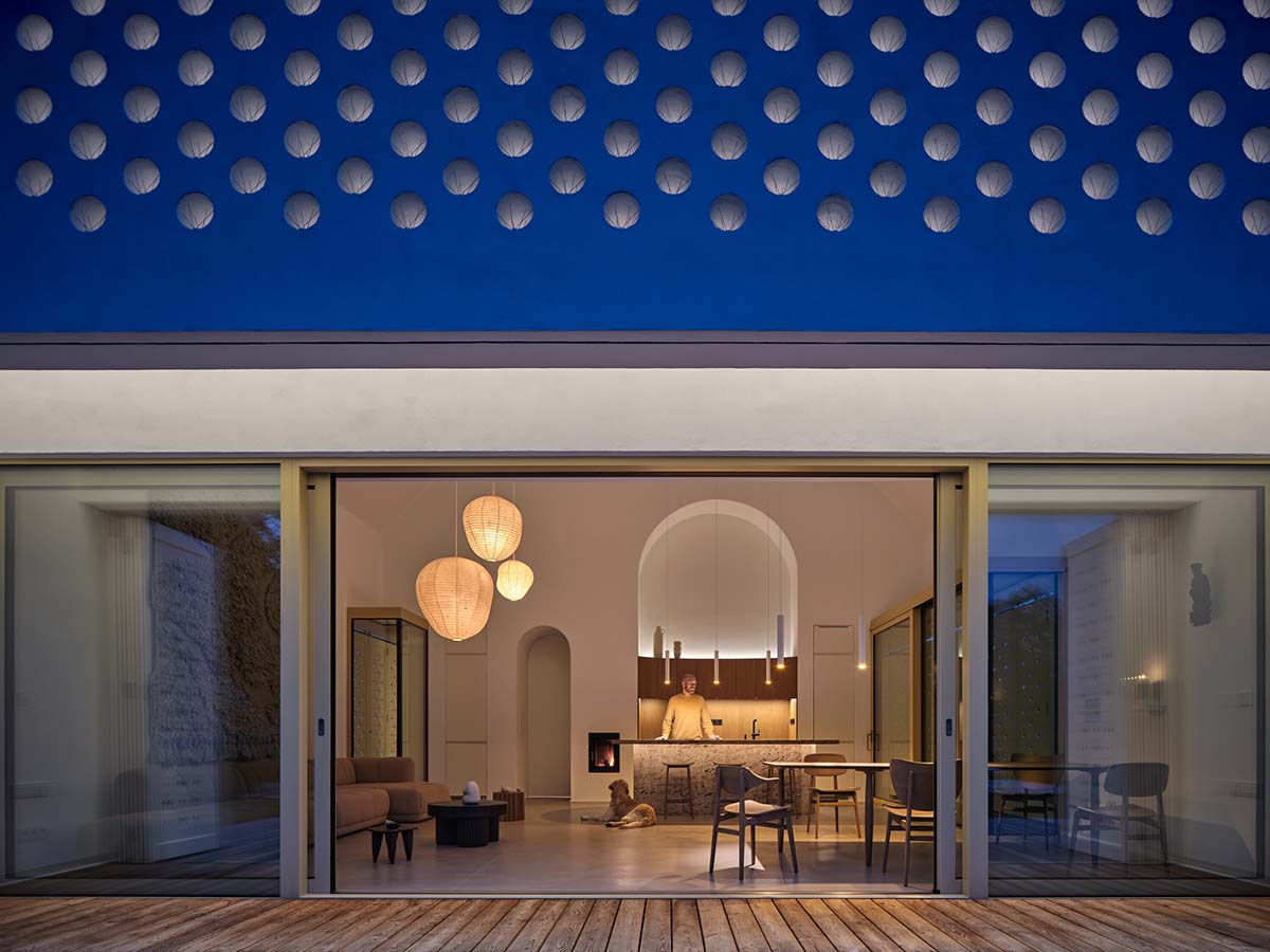 Jan Žaloudek Architekt converts a Baroque barn into a light-filled house with perforated gable wall