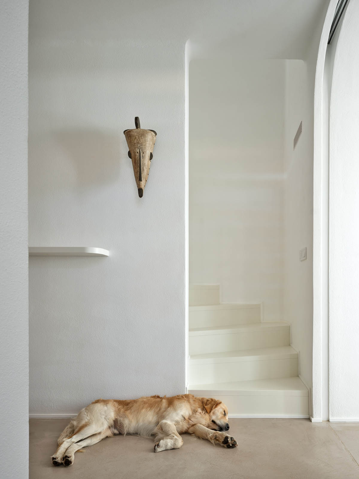 Jan Žaloudek Architekt converts a Baroque barn into a light-filled house with perforated gable wall