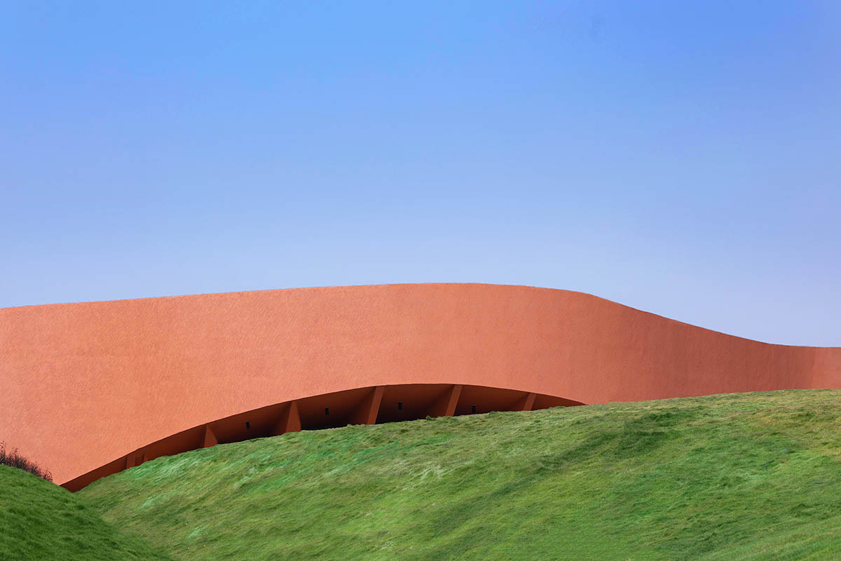 sP+a completes India's new arts centre, Hampi Art Labs, with sinuous concrete volume