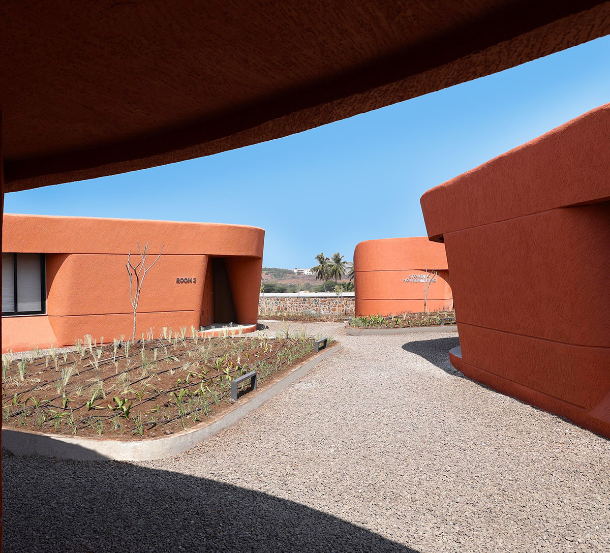 sP+a completes India's new arts centre, Hampi Art Labs, with sinuous concrete volume
