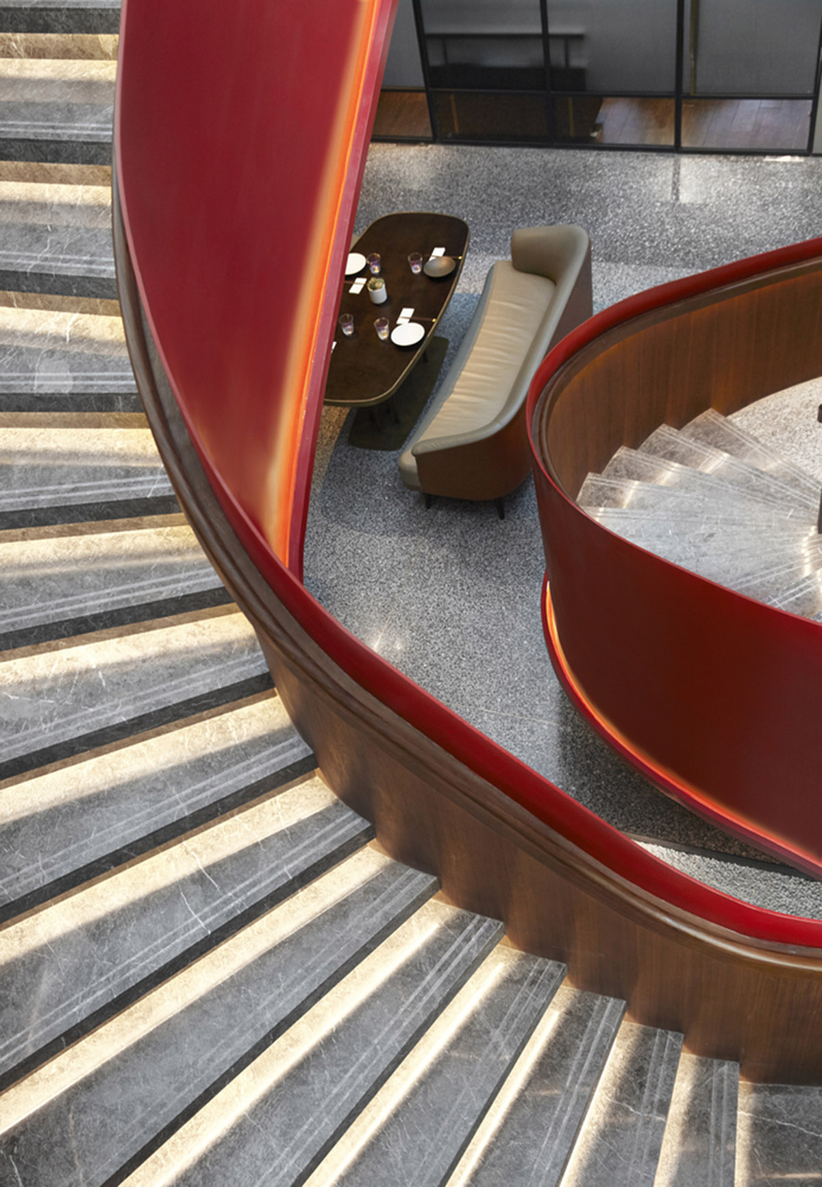 FUNUN LAB completes restaurant with ribbon-like red sculptural staircase in Beijing