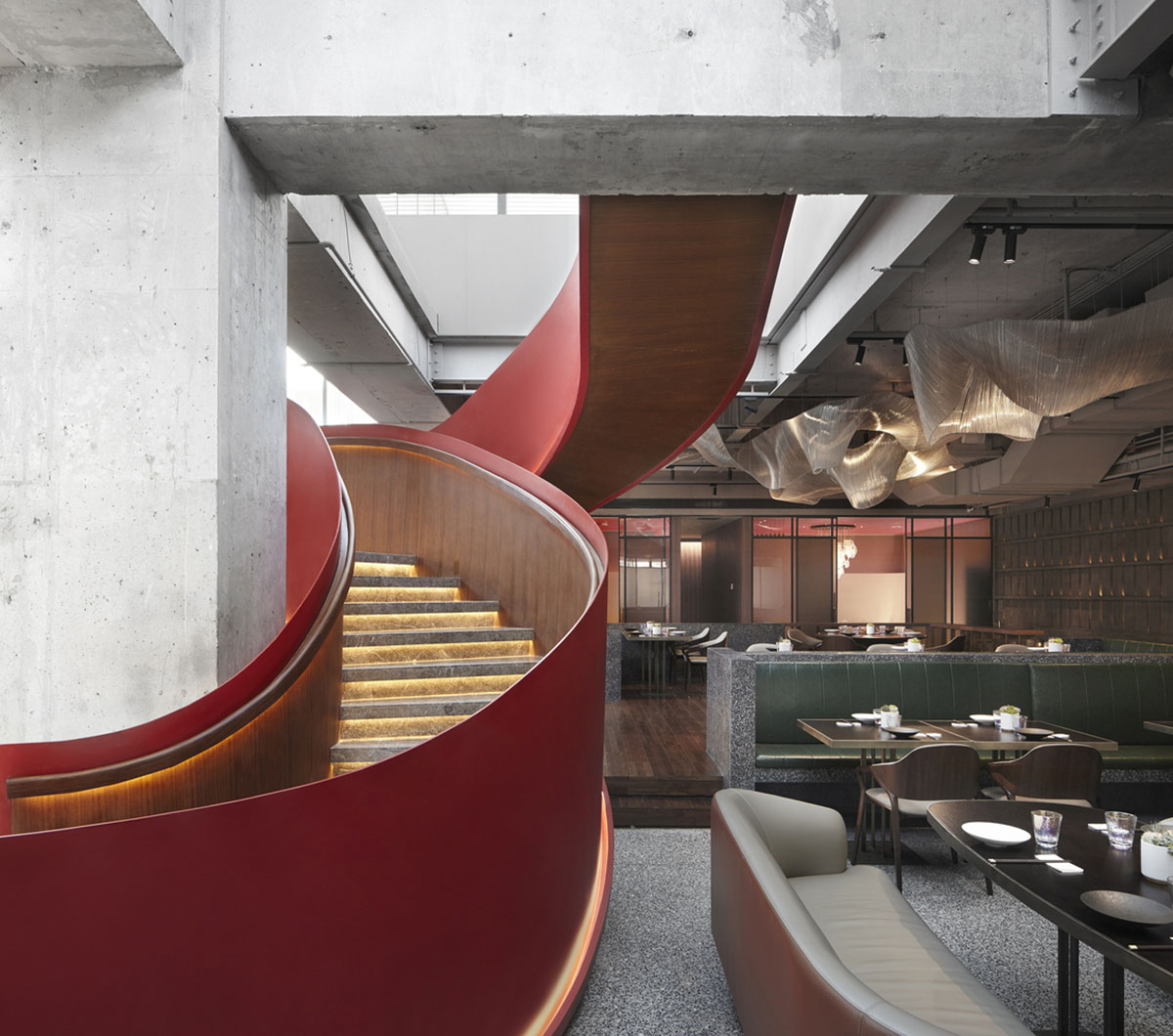 FUNUN LAB completes restaurant with ribbon-like red sculptural staircase in Beijing