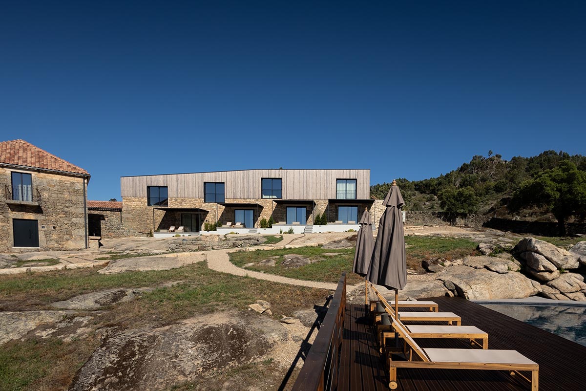 PLATAFORMArq built retreat within tunnel-like stone walls to create 