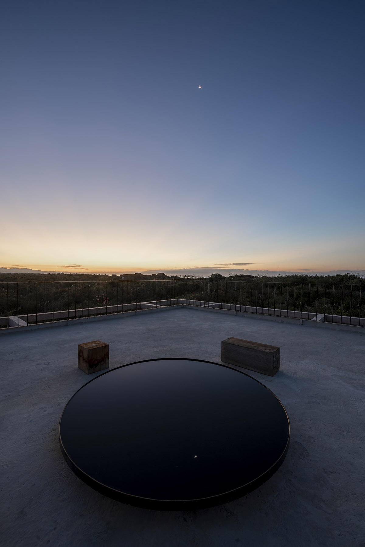 Concrete columns and beams wrap Cosmos House designed by S-AR in Mexico