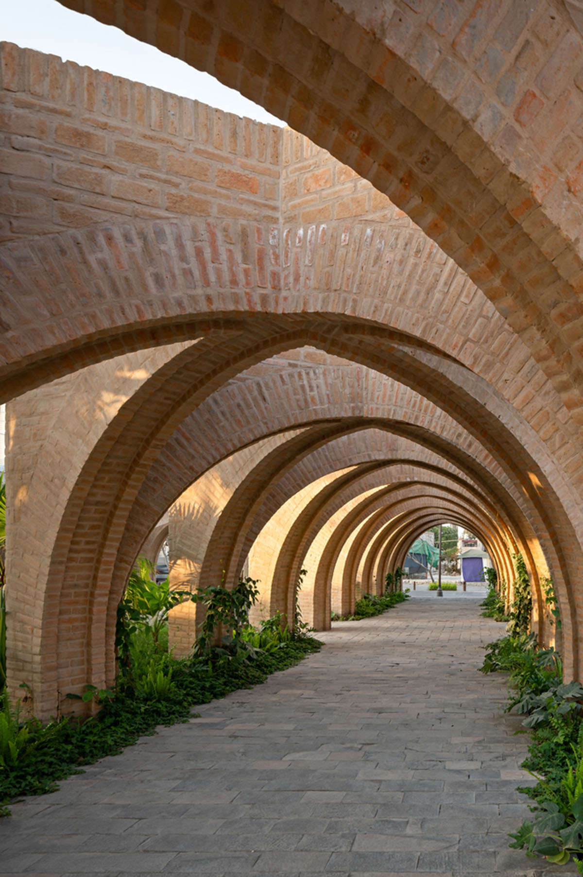 MMX revives public space with monolithic brick arcades in Jojutla, Mexico