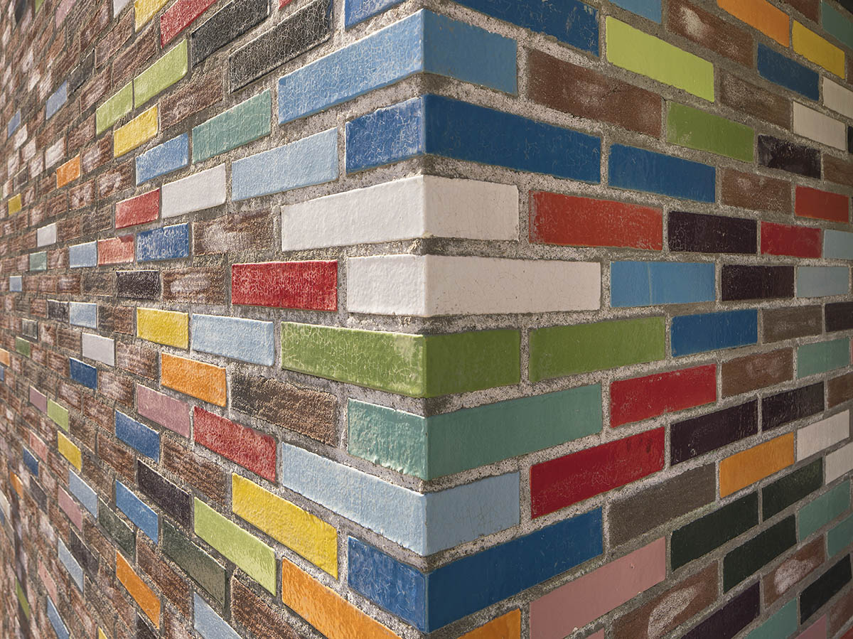 JKMM Architects completes new housing featuring colorful brick patterns on facade in Finland