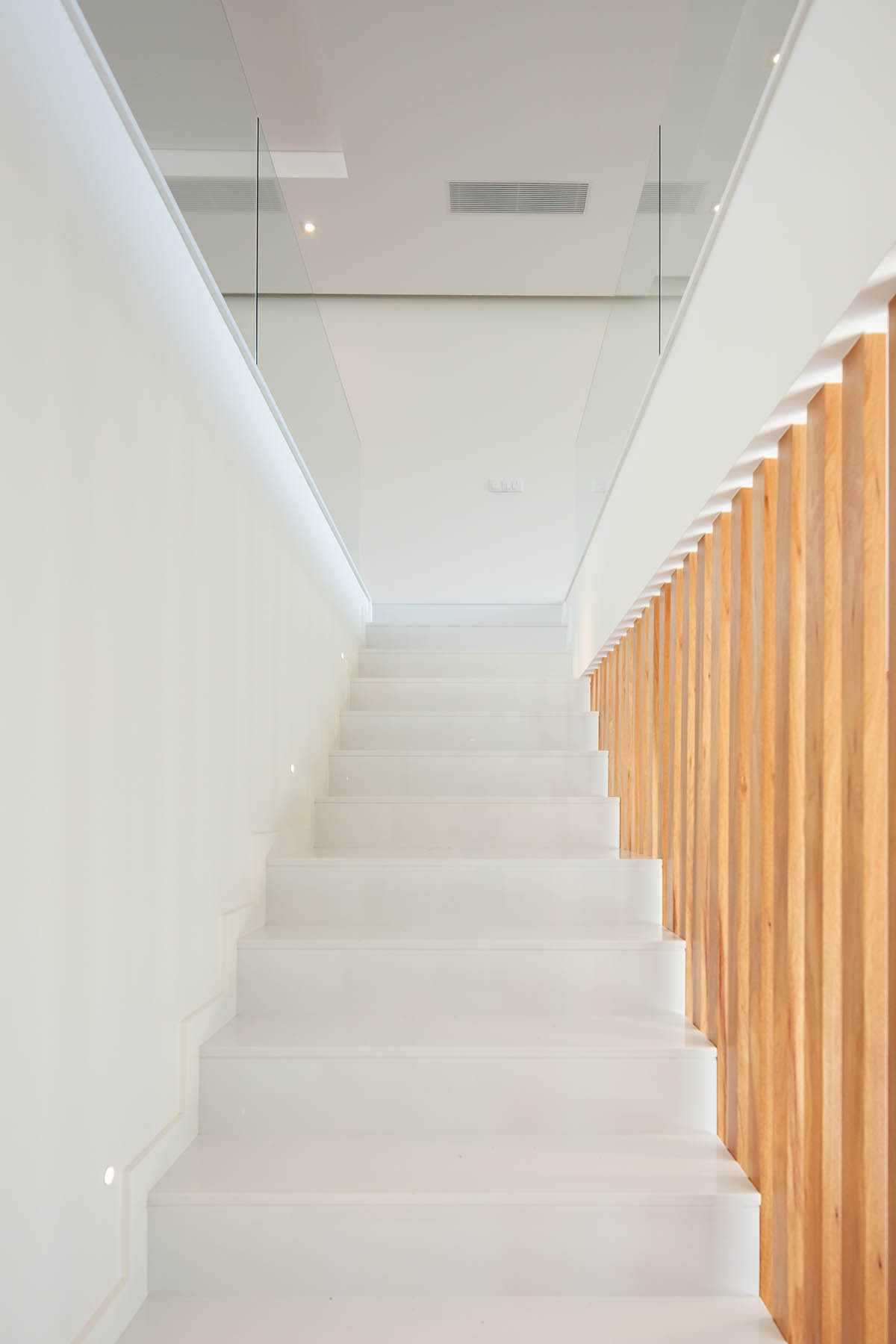 Grupo Zegnea's linear Portuguese houses create fluidity of space with large openings towards nature