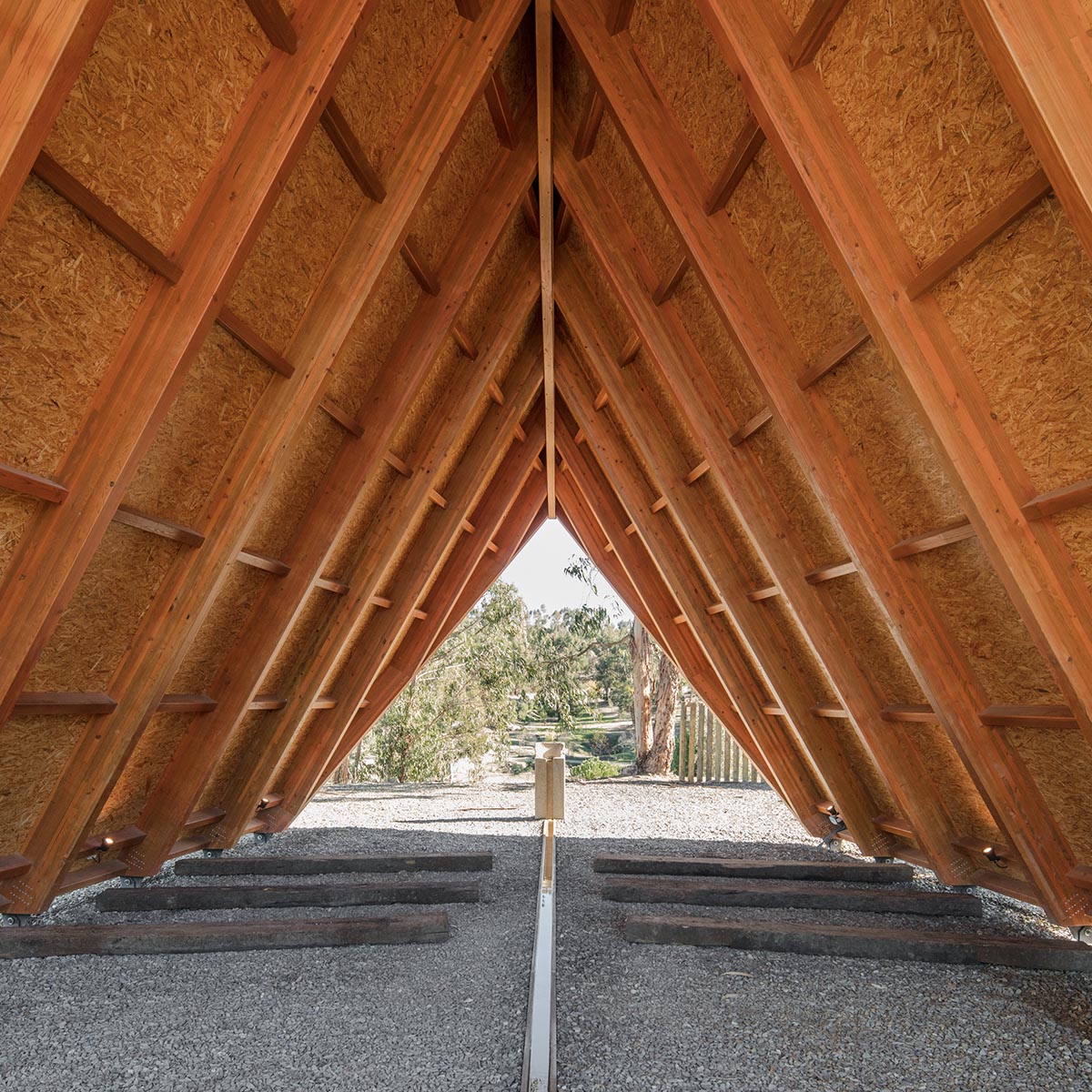 Plano Humano Arquitectos completes passageway-looking chapel in Portugal