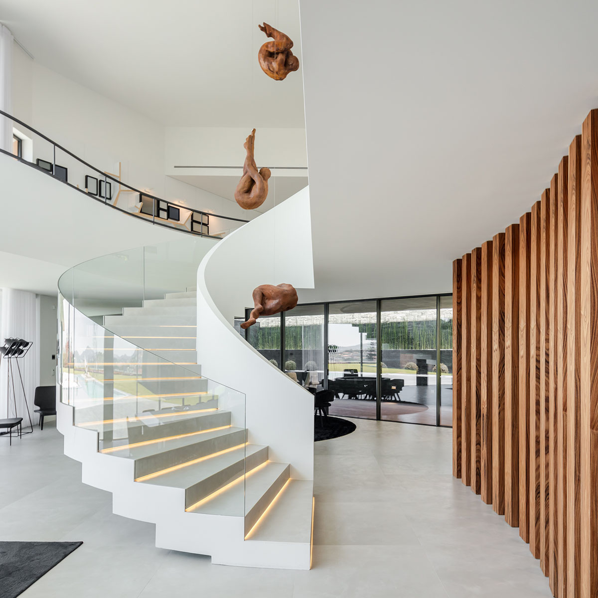 TRAMA Arquitetos completes v-shaped concrete house on hillside of Braga
