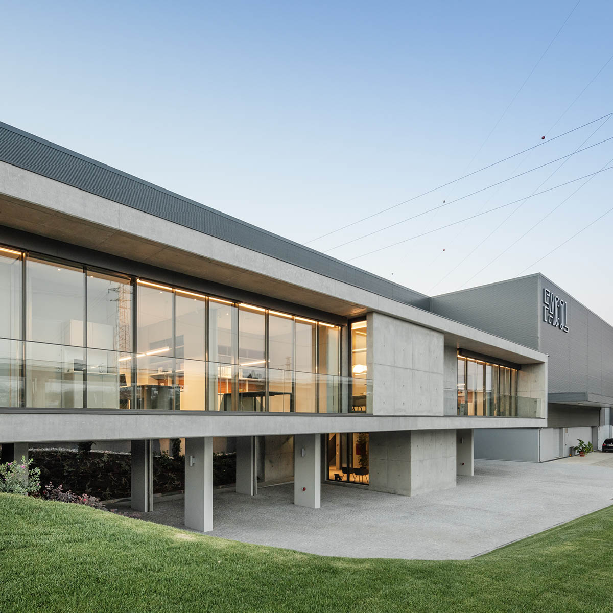 Ana Coelho Arquitectura converts old industrial complex into office building with elongated volume