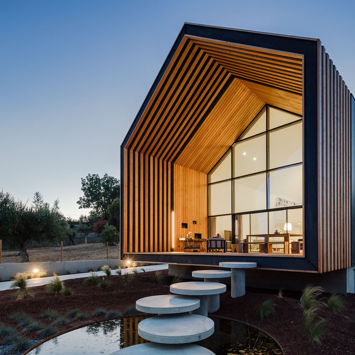 Filipe Saraiva integrates this single family house smoothly with existing landscape in Ourém