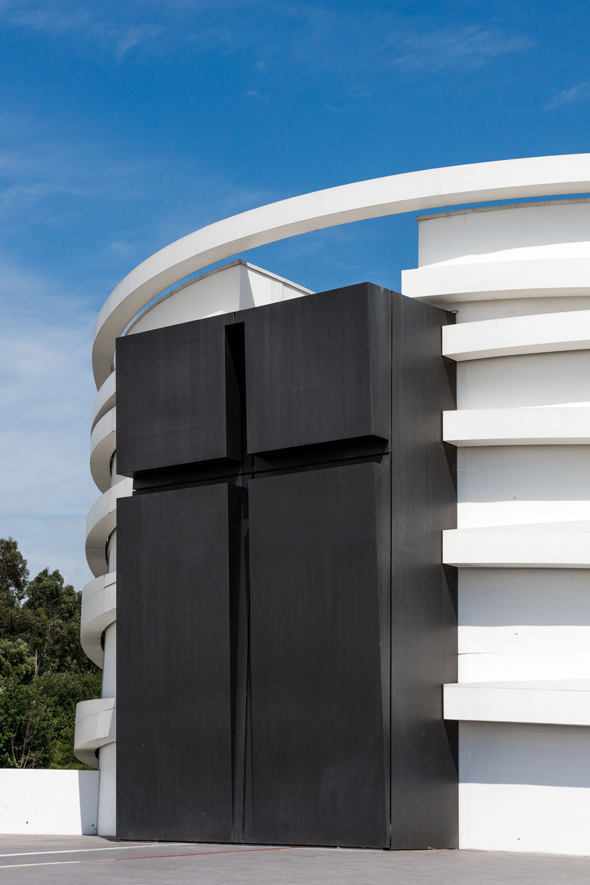 Hugo Correia completes elliptical church featuring sharp concrete lines in Portugal