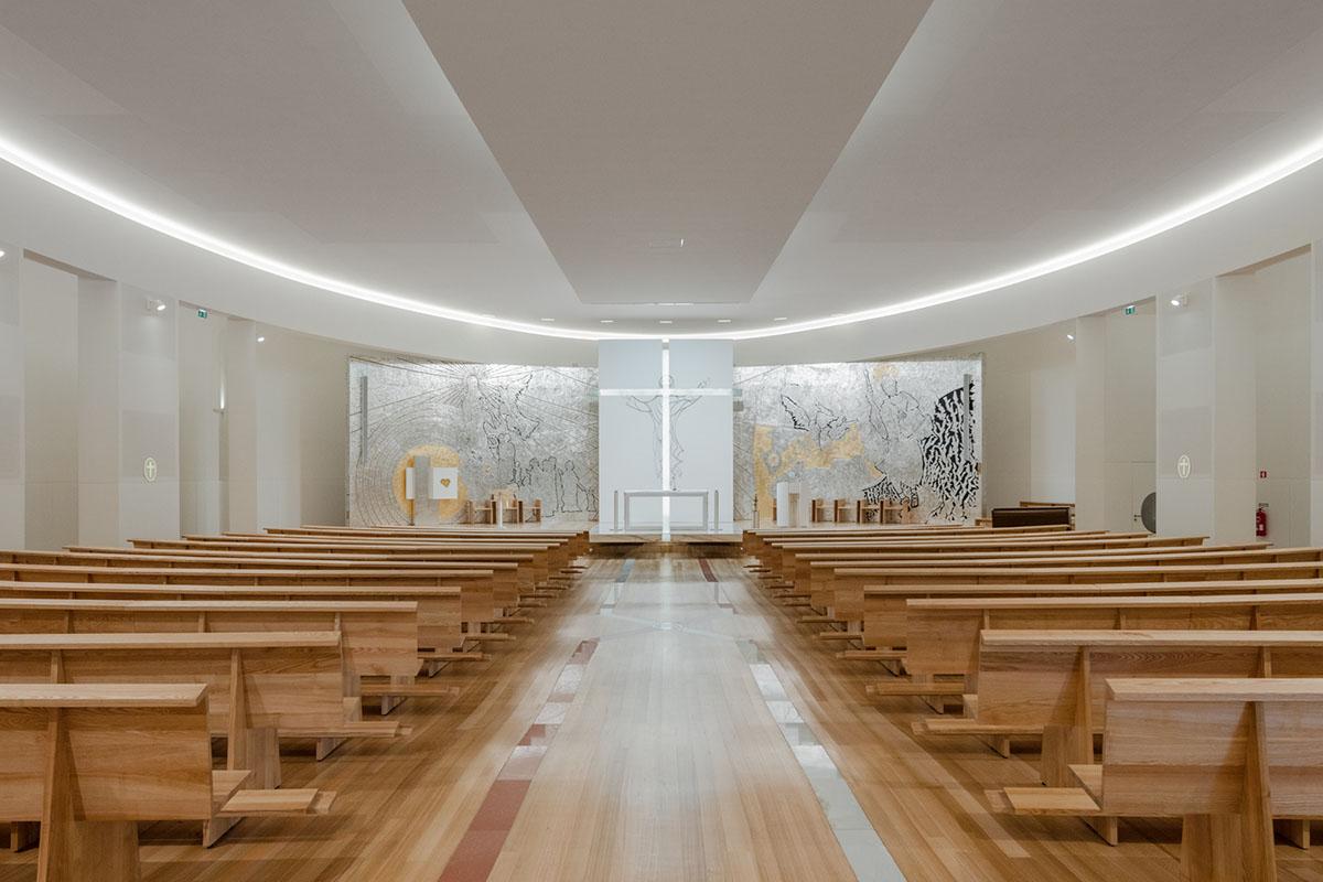 Hugo Correia completes elliptical church featuring sharp concrete lines in Portugal