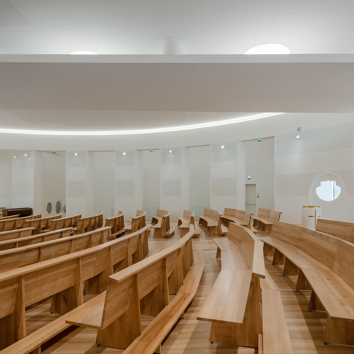 Hugo Correia completes elliptical church featuring sharp concrete lines in Portugal
